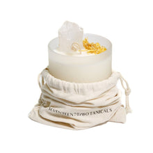 Load image into Gallery viewer, Sea salt caramel and clear quartz candle with decorative elements on a white background, featuring the brand 'Seventeen70 Botanicals'.

