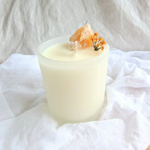 Load image into Gallery viewer, Golden wattle with yellow calcite candle with decorative elements on a white fabric background
