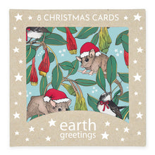 Load image into Gallery viewer, Box of Christmas cards with illustrations of animals wearing Santa hats, featuring the brand &#39;earth greetings&#39;.
